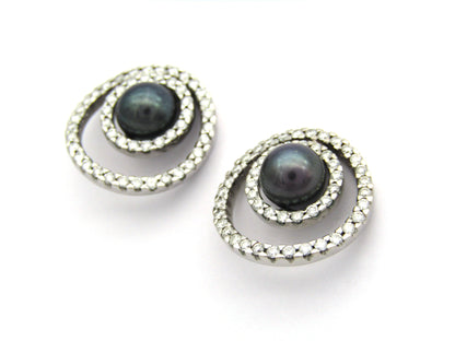 18K gold tahitian pearl and diamond earrings.