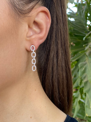 18K gold diamond drop earrings.