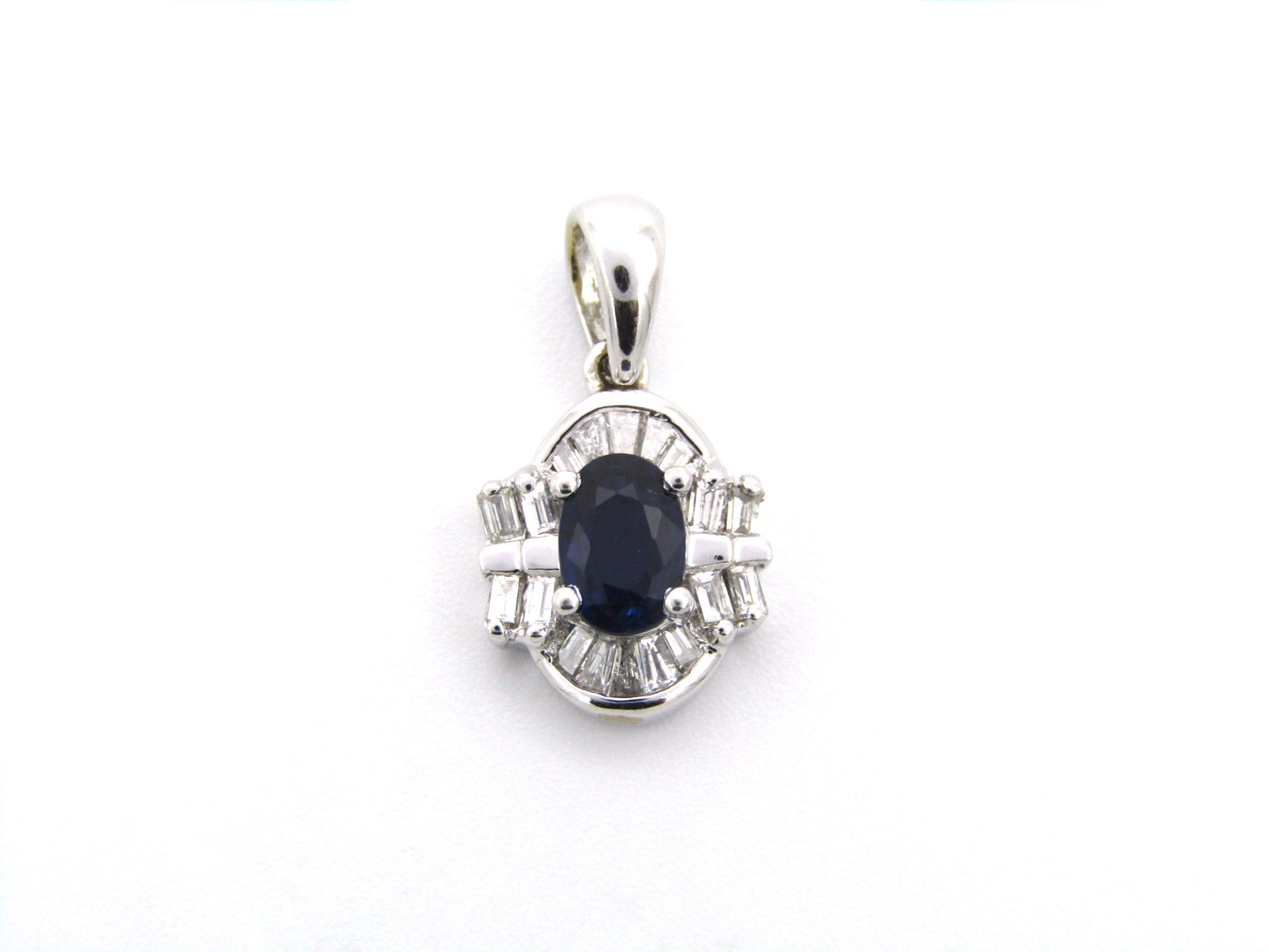 18K gold sapphire and diamond pendant.