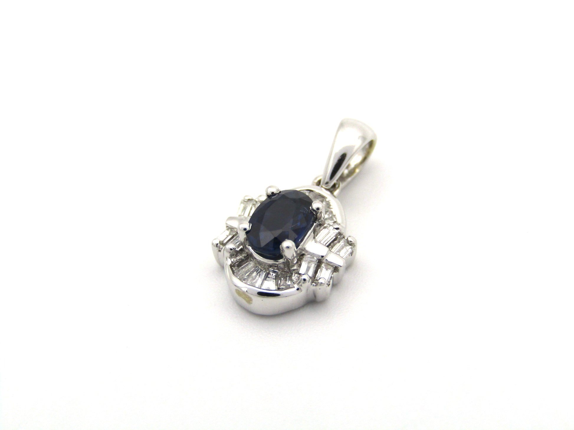 18K gold sapphire and diamond pendant.