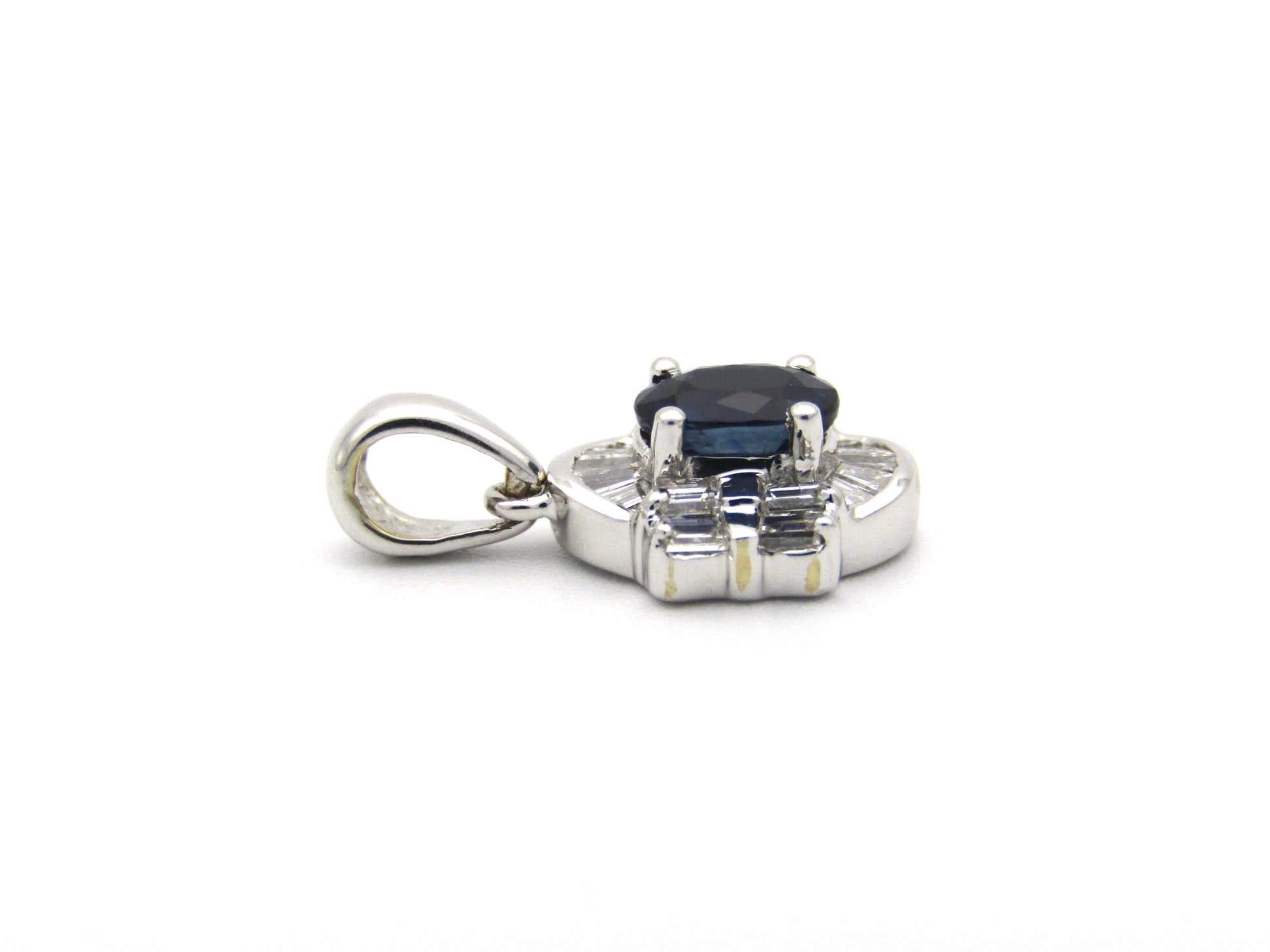 18K gold sapphire and diamond pendant.