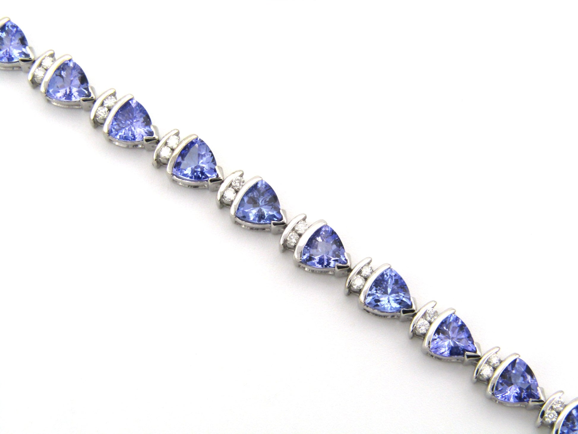 18K gold tanzanite and diamond bracelet.