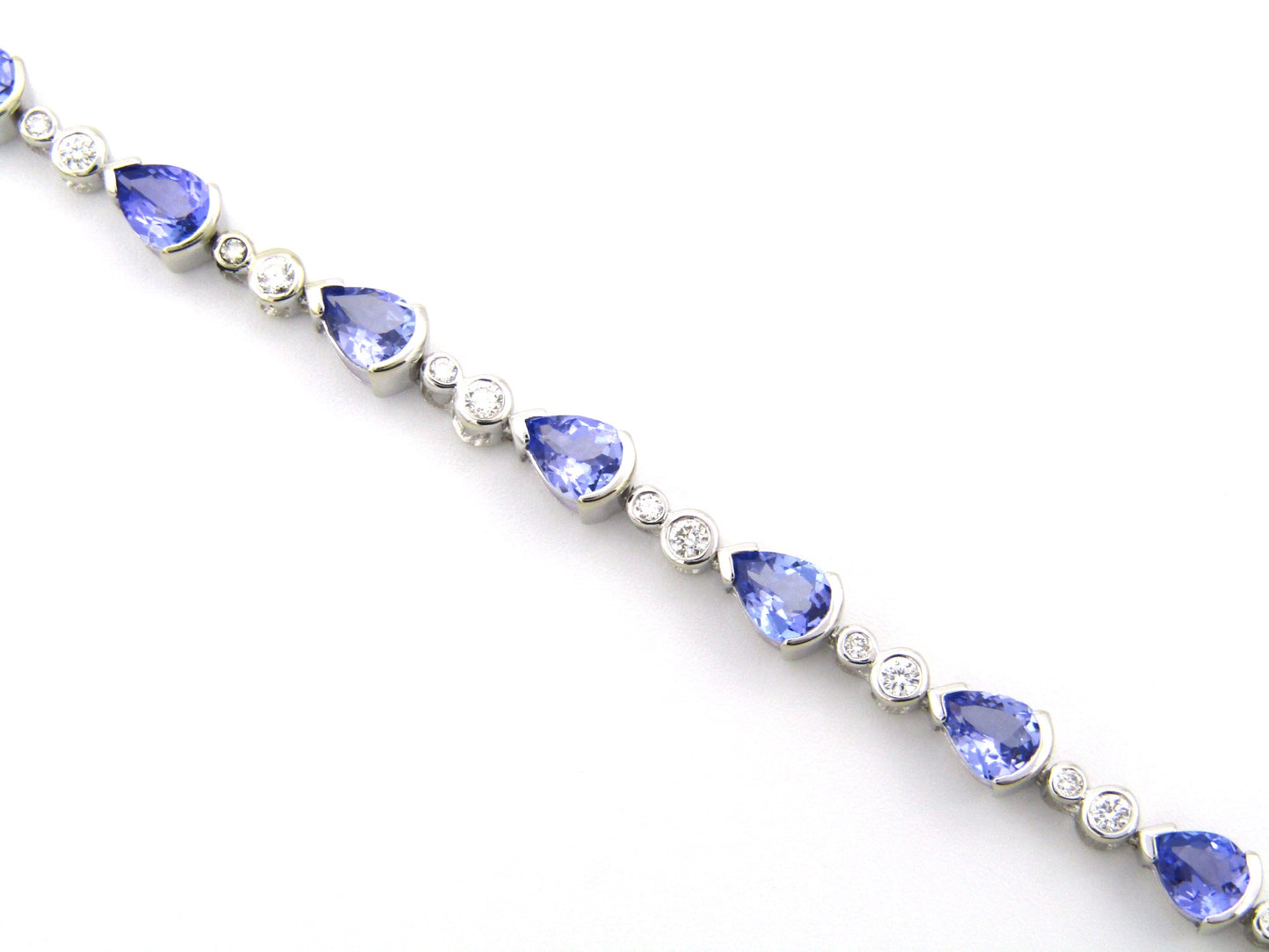 18K gold tanzanite and diamond bracelet.