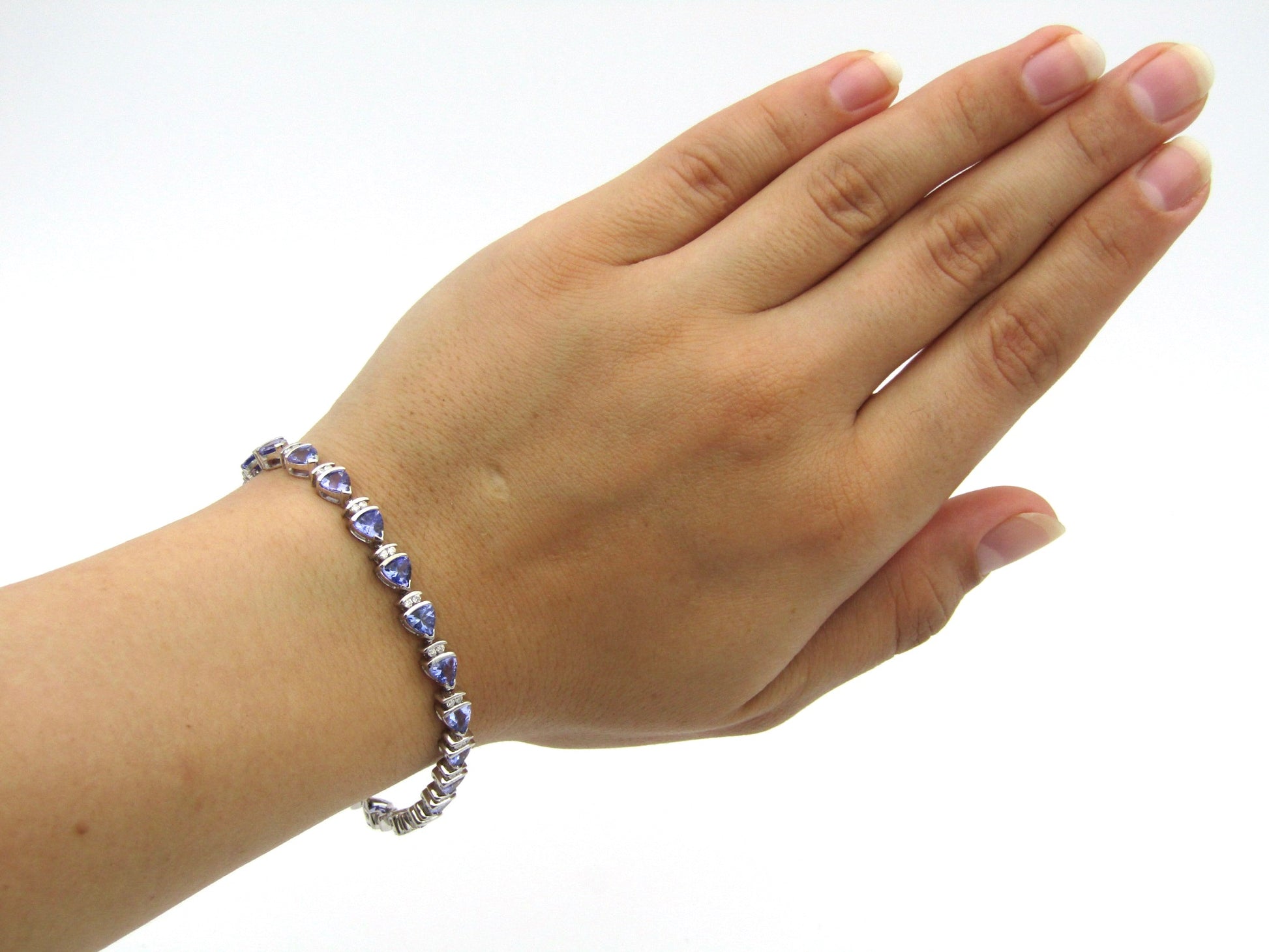 18K gold tanzanite and diamond bracelet.