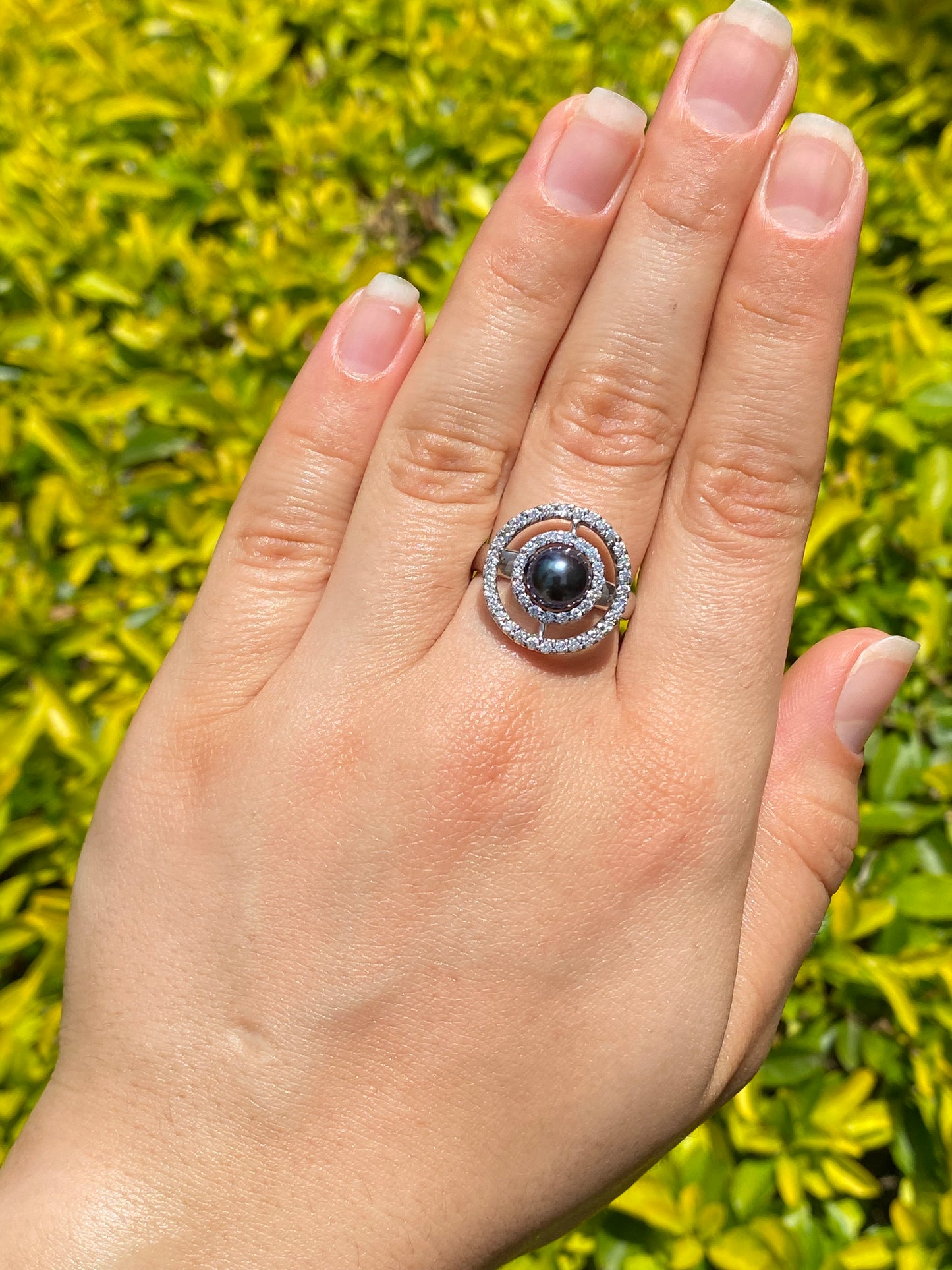 18K gold Tahitian pearl and diamond ring.