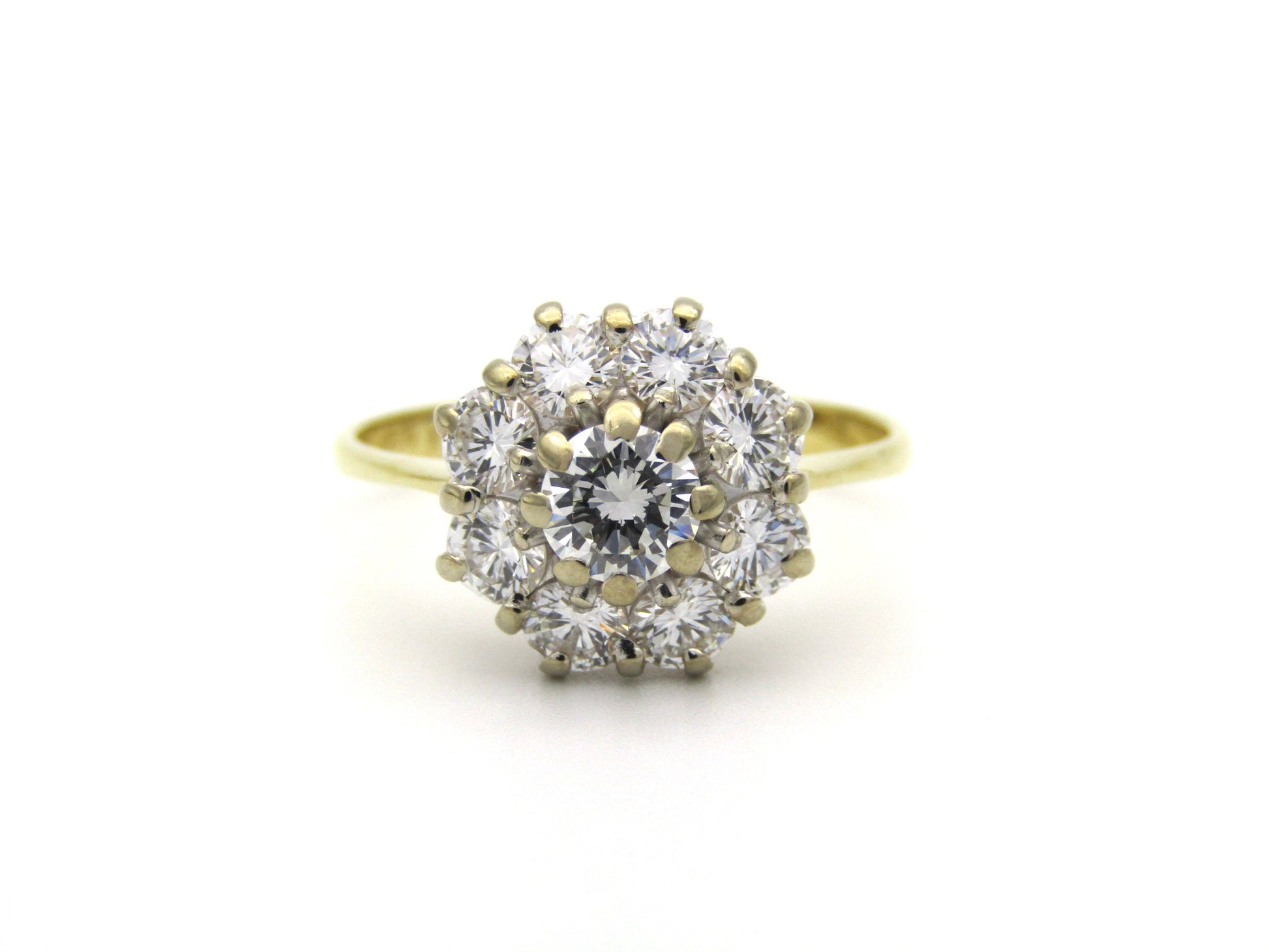 18K gold diamond flower ring.