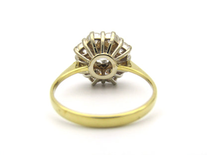 18K gold diamond flower ring.