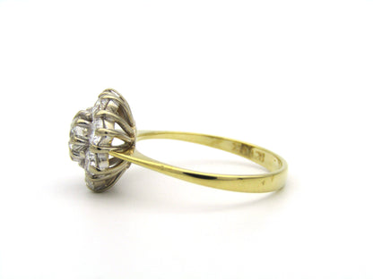 18K gold diamond flower ring.