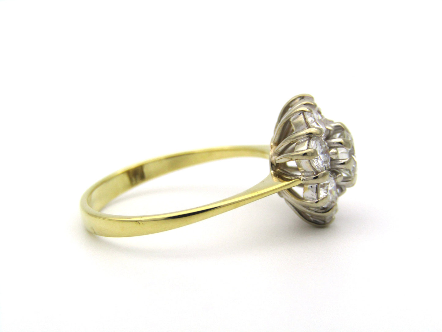 18K gold diamond flower ring.