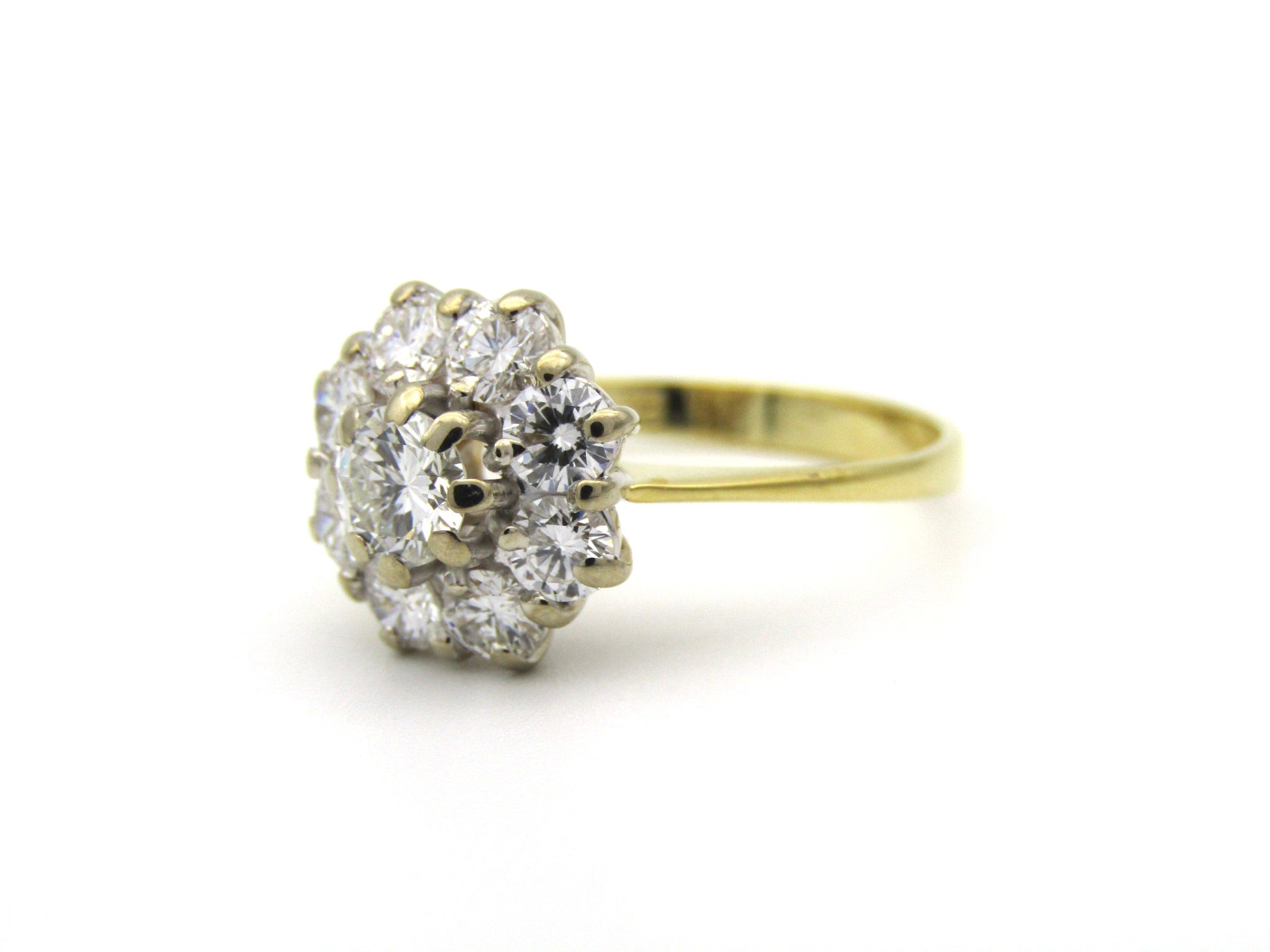 18K gold diamond flower ring.