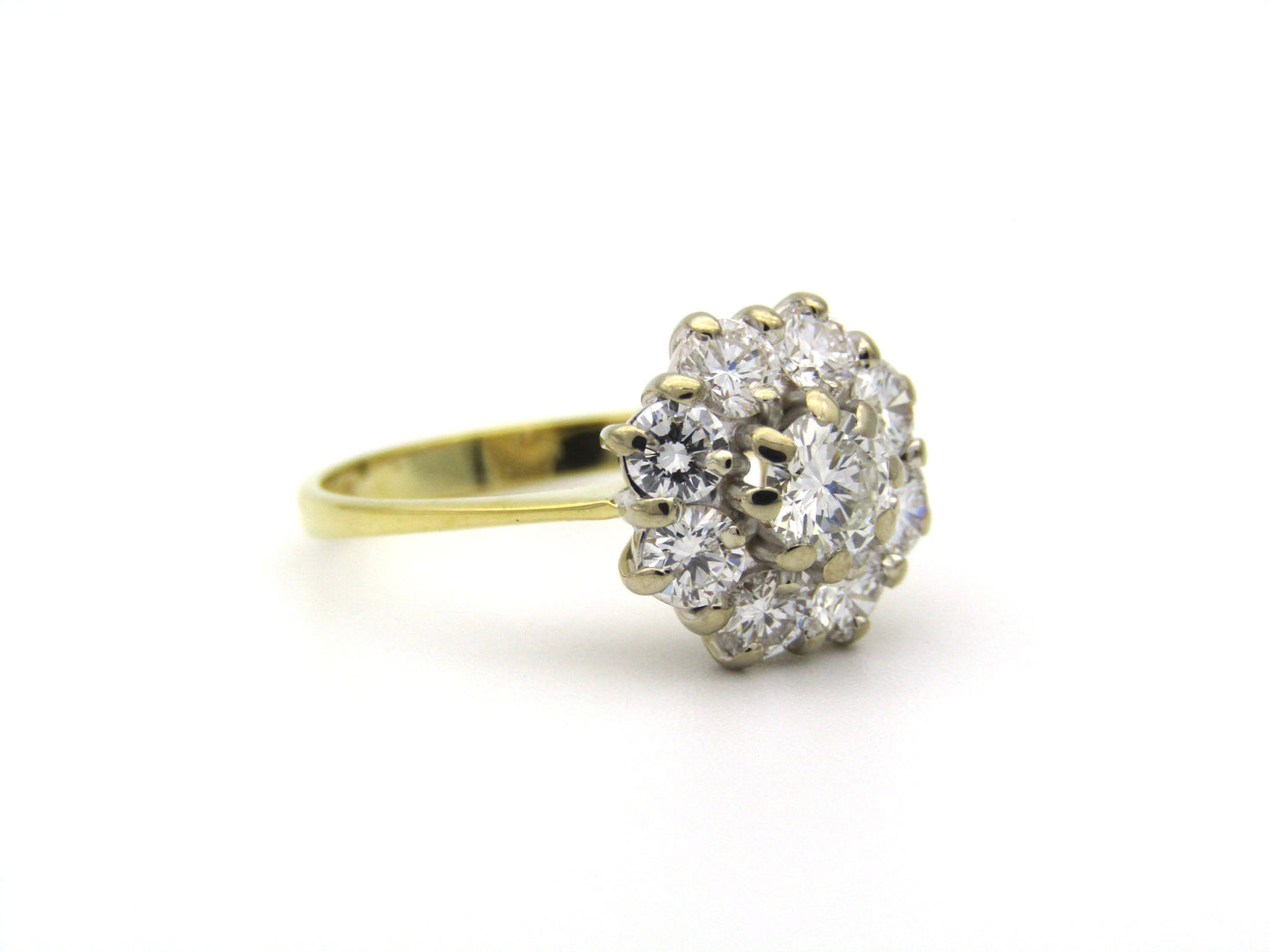 18K gold diamond flower ring.