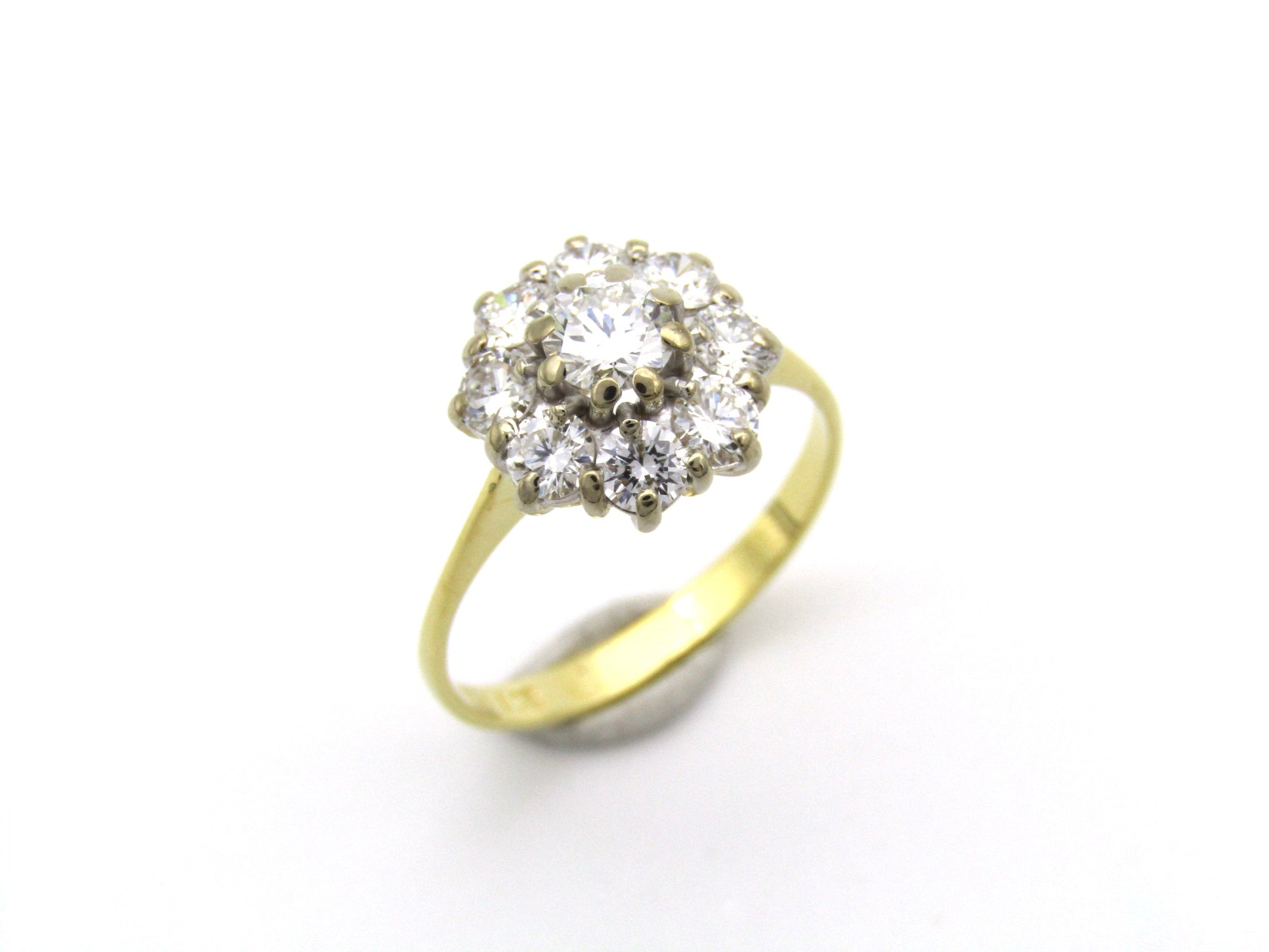 18K gold diamond flower ring.