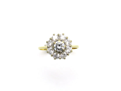 18K gold diamond flower ring.