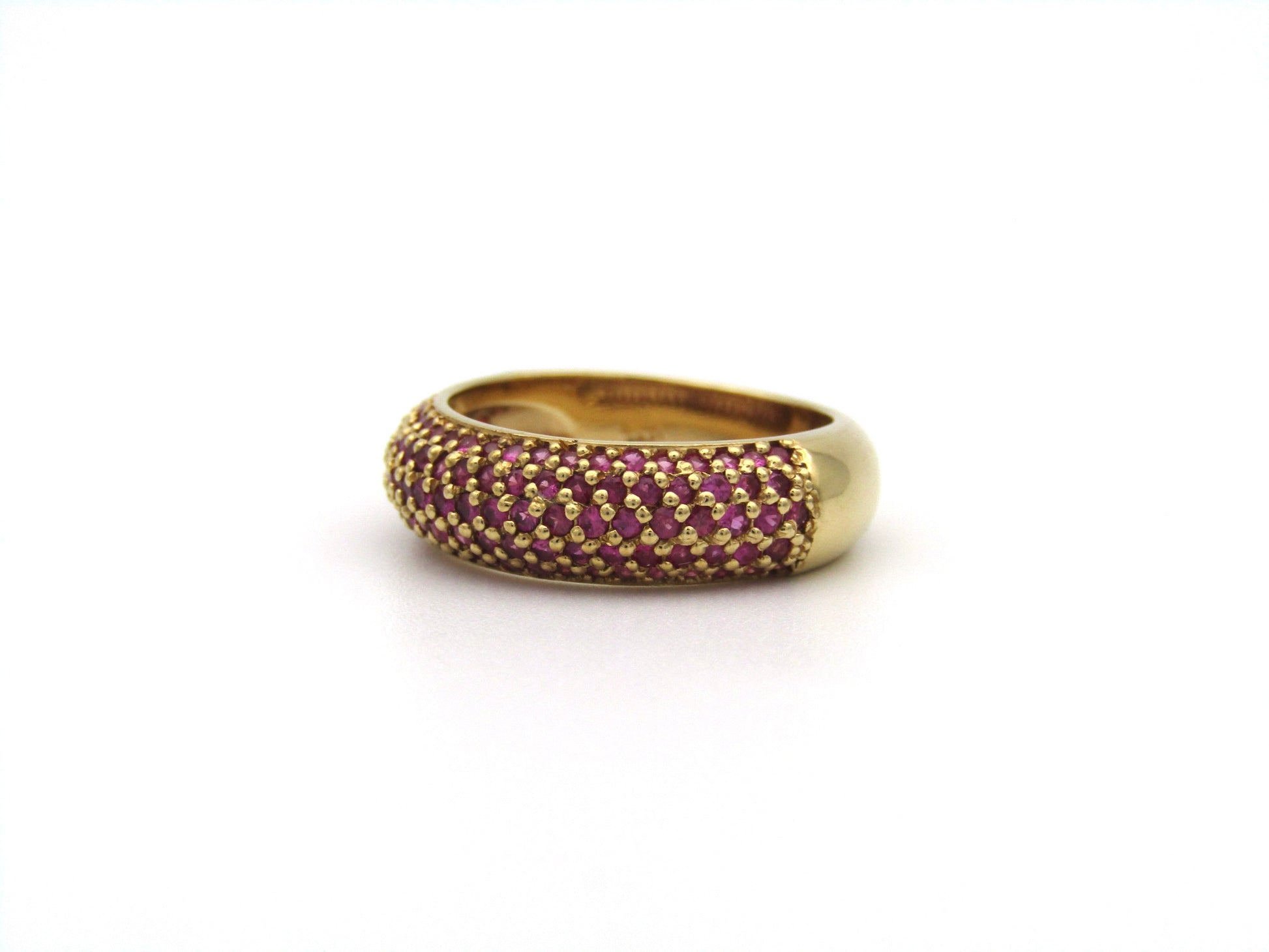 18K gold pavé ruby bombe ring.