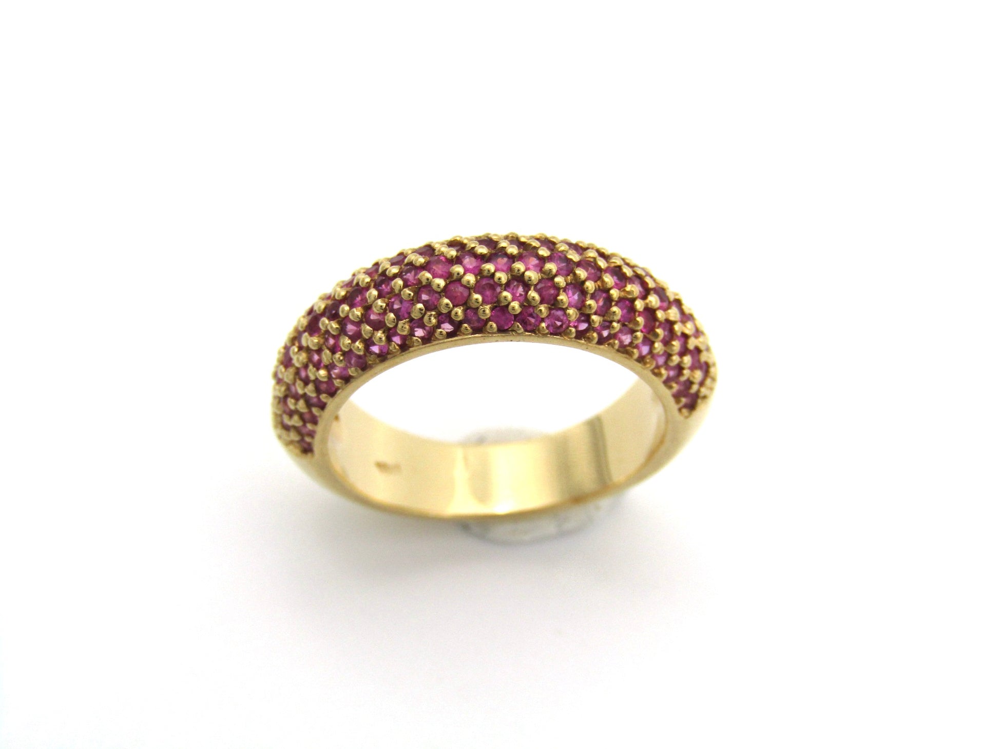 18K gold pavé ruby bombe ring.