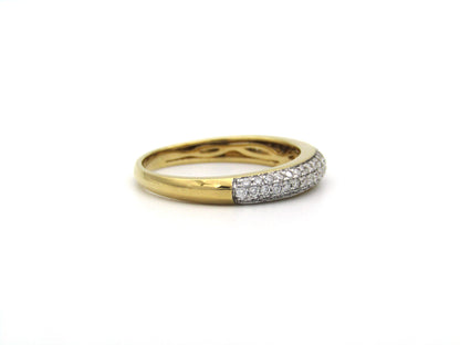 18K gold pavé diamond ring.