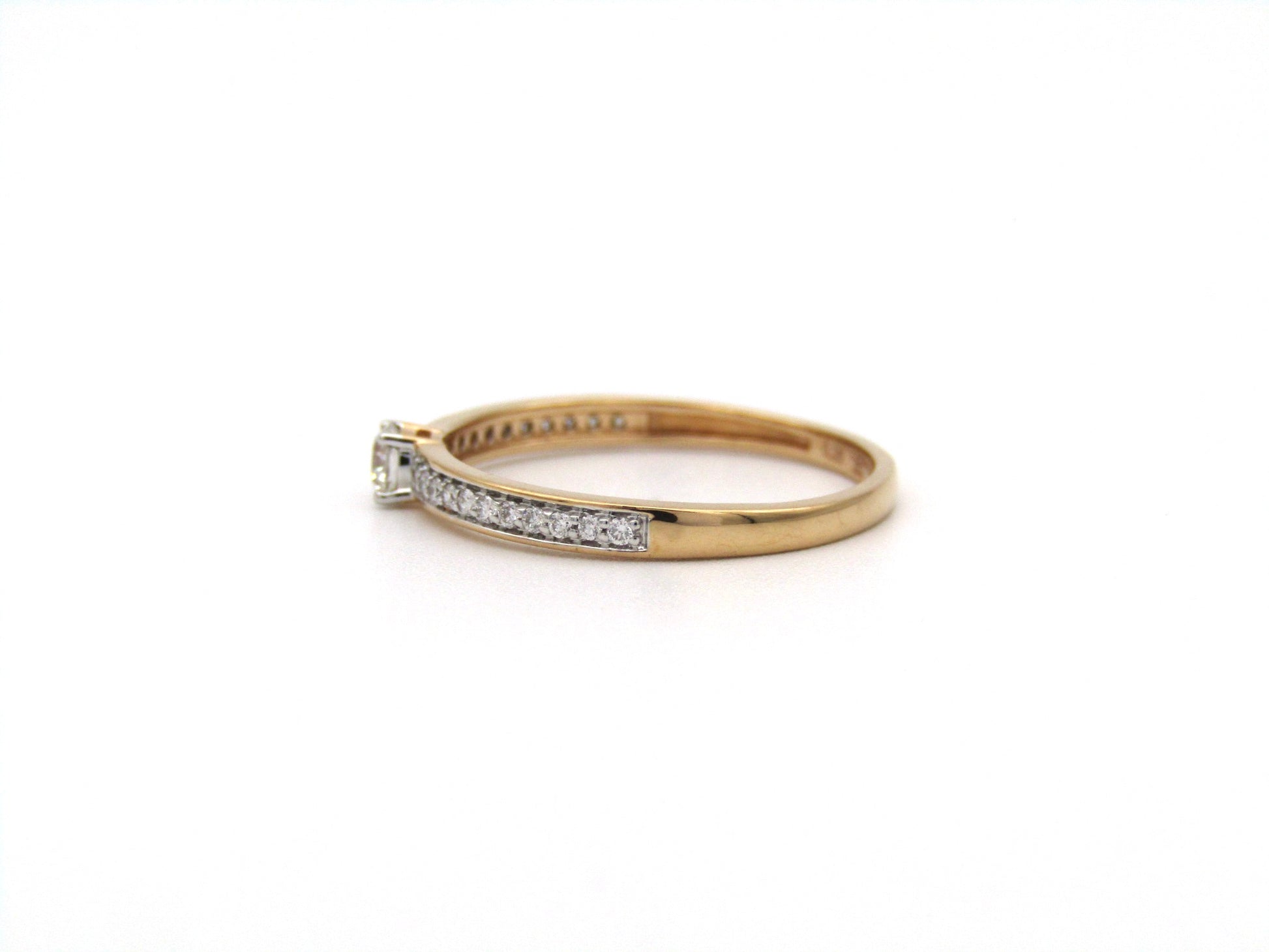 18K gold diamond ring.