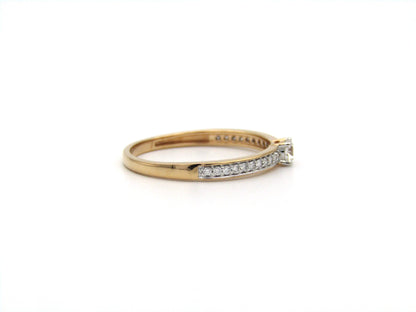 18K gold diamond ring.