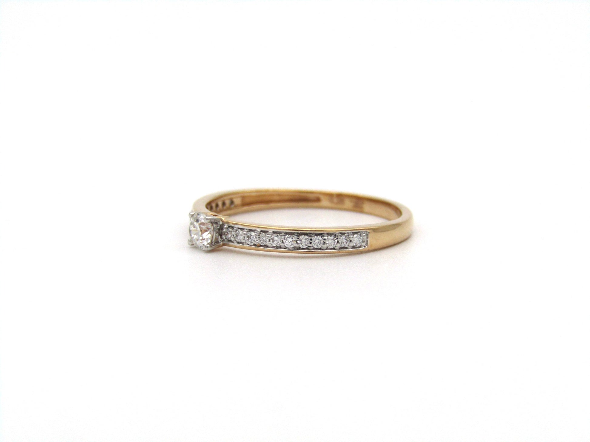 18K gold diamond ring.