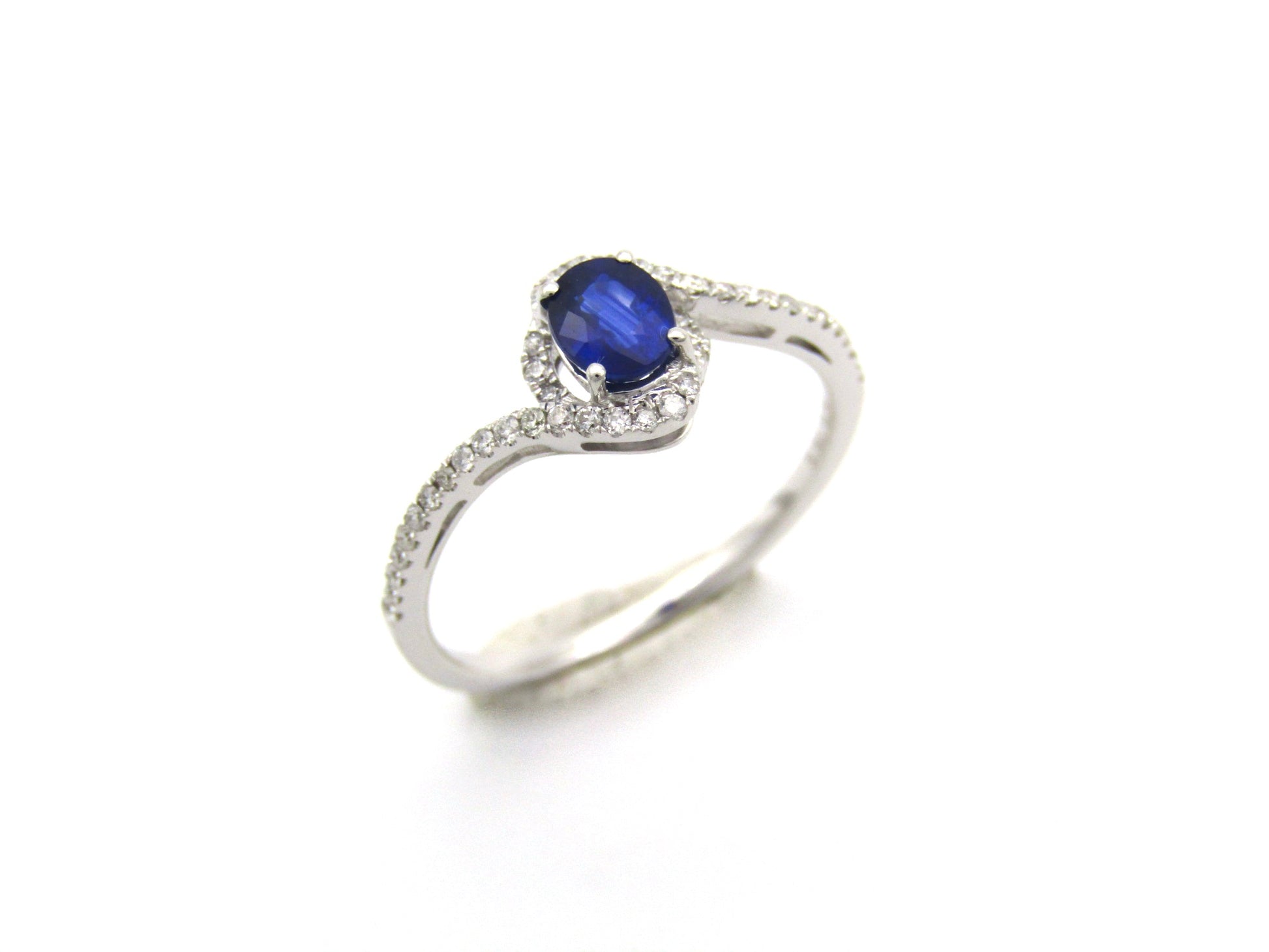 18K gold sapphire and diamond ring.