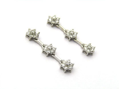 18K gold diamond drop flower earrings by Browns.