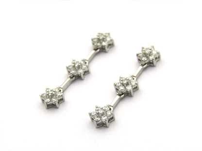 18K gold diamond drop flower earrings by Browns.