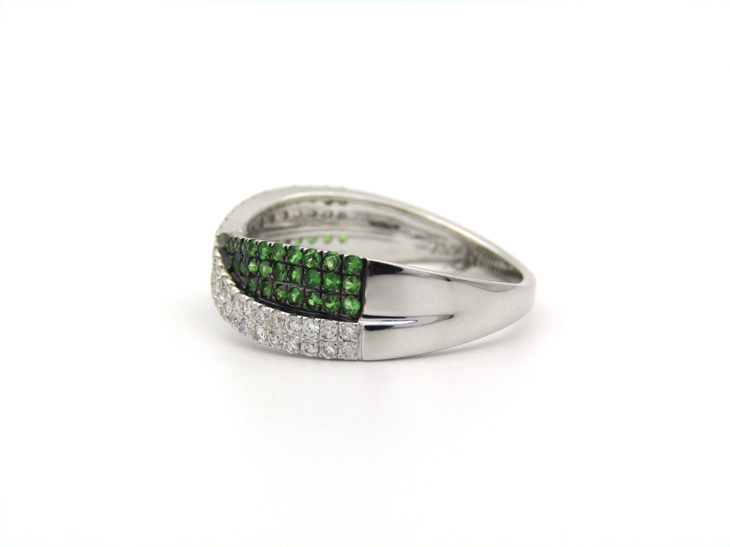 18K gold tsavorite garnet and diamond crossover ring.