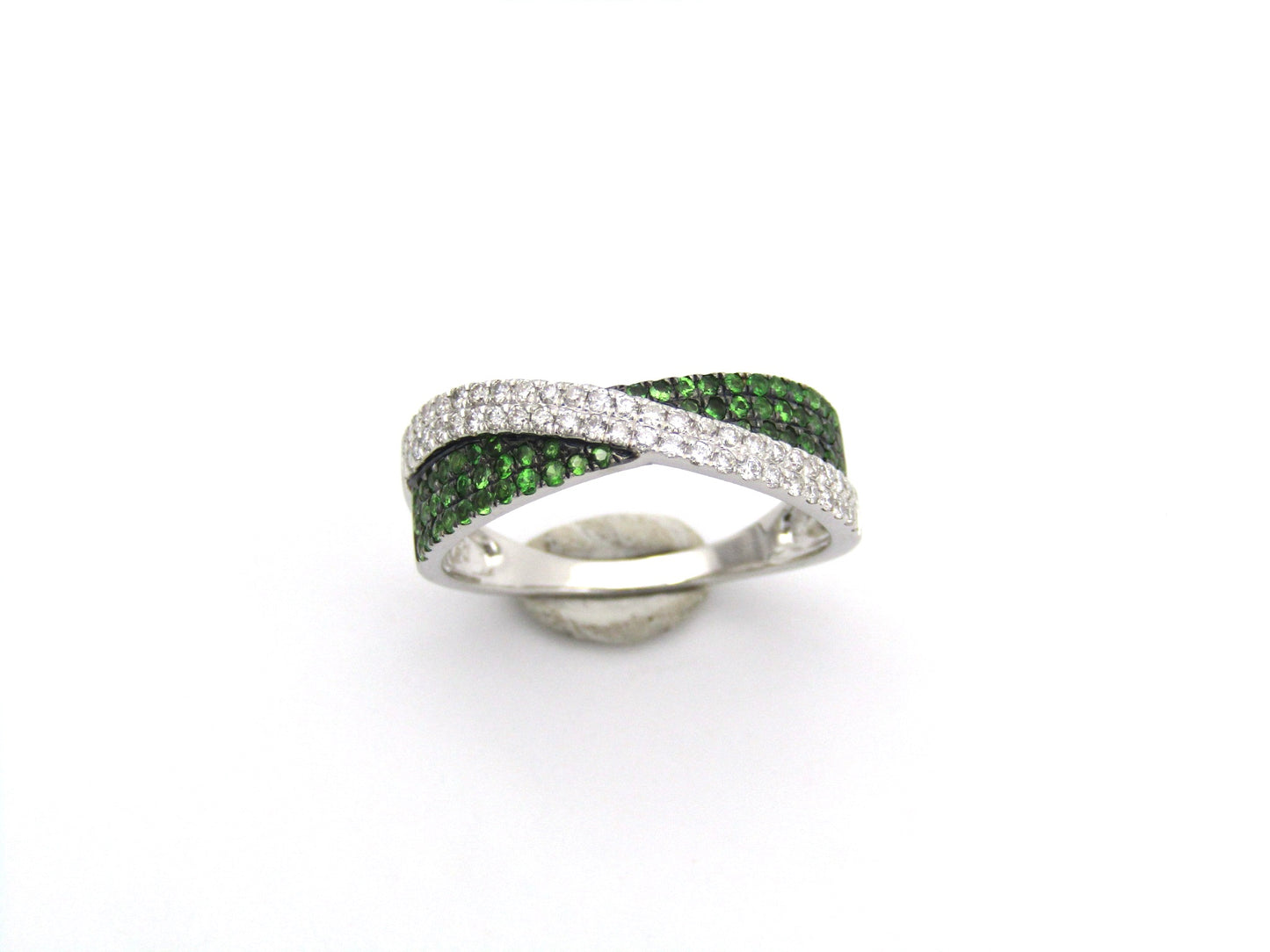 18K gold tsavorite garnet and diamond crossover ring.