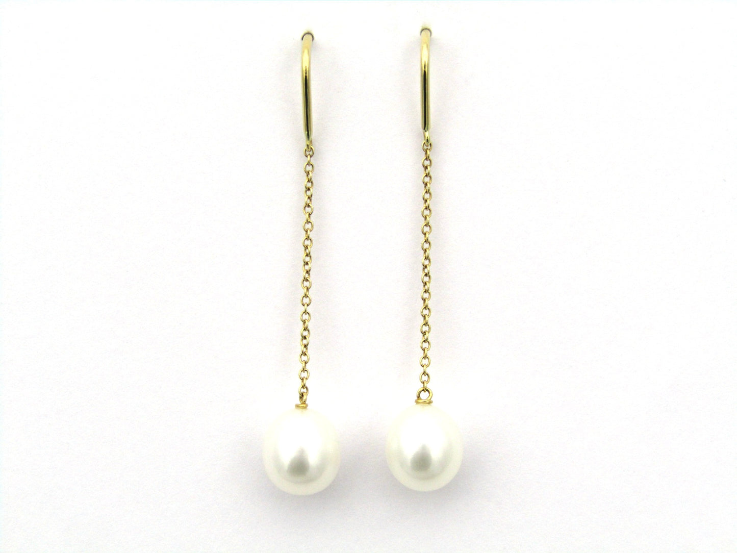 18K gold Tiffany & Co. "Pearls by the Yard" chain earrings.