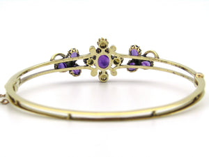 14K gold Edwardian amethyst, pearl, and diamond bangle.