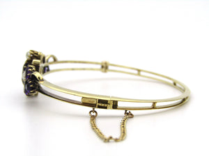 14K gold Edwardian amethyst, pearl, and diamond bangle.