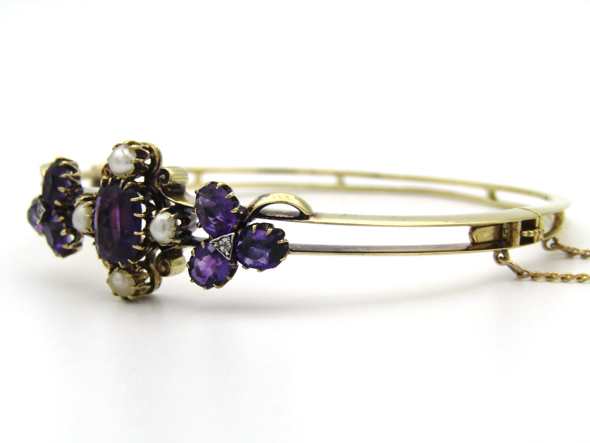 14K gold Edwardian amethyst, pearl, and diamond bangle.