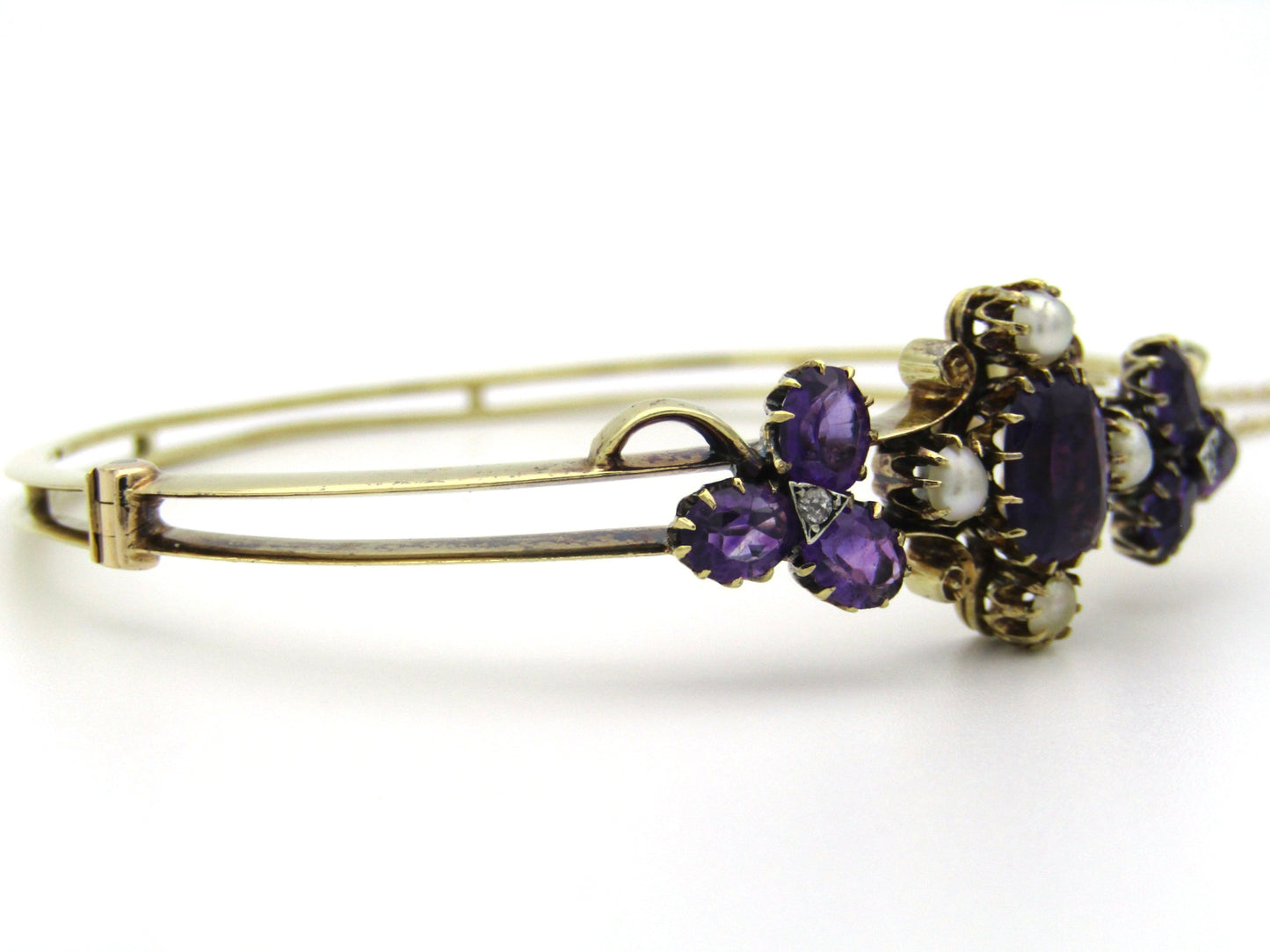 14K gold Edwardian amethyst, pearl, and diamond bangle.