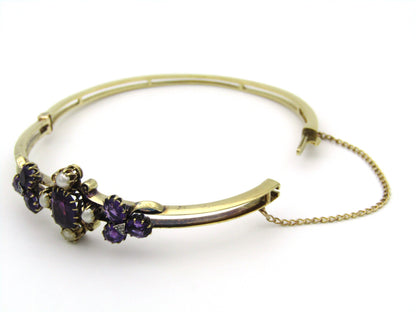 14K gold Edwardian amethyst, pearl, and diamond bangle.