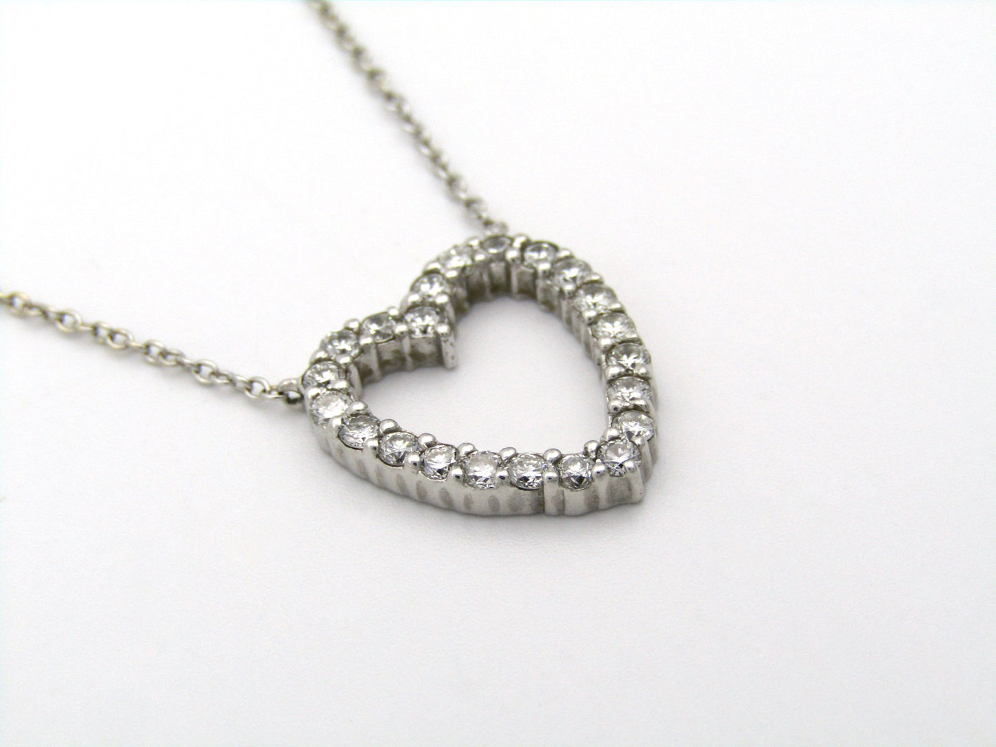 18K gold diamond heart necklace by Browns.