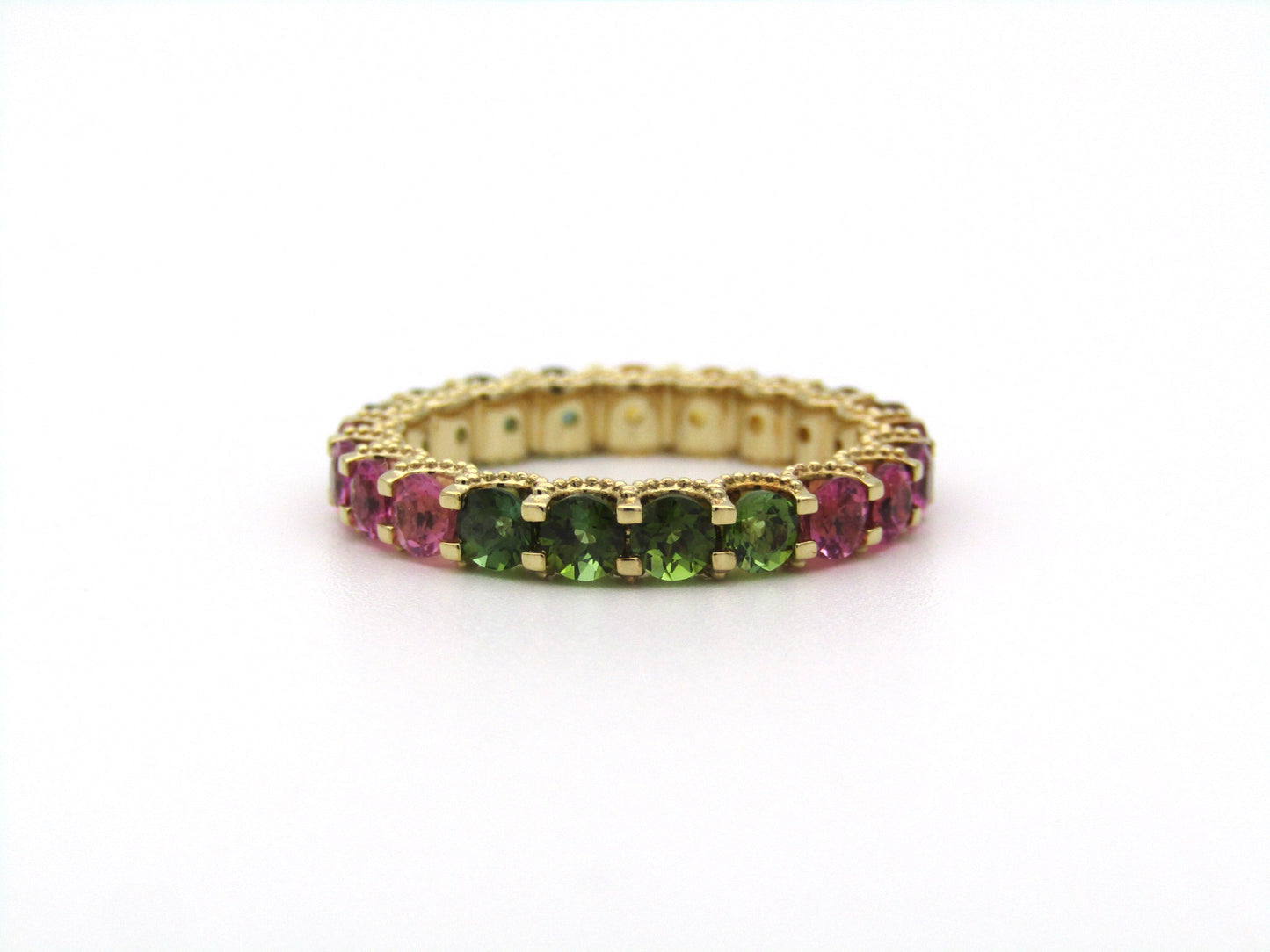 14K gold tourmaline eternity ring.