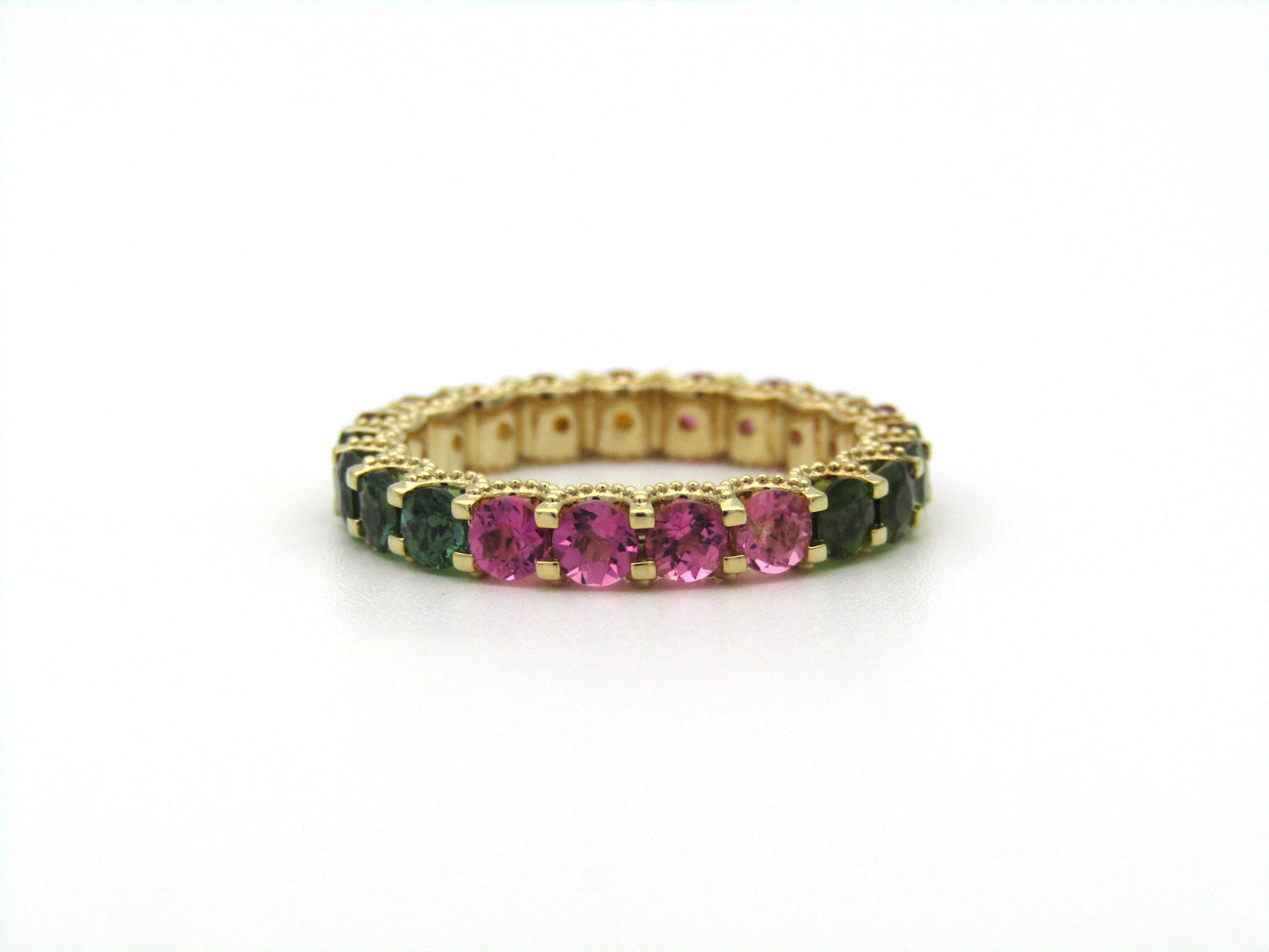 14K gold tourmaline eternity ring.