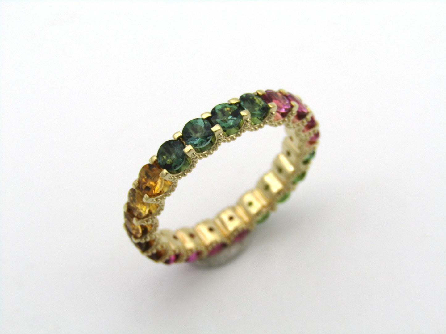 14K gold tourmaline eternity ring.