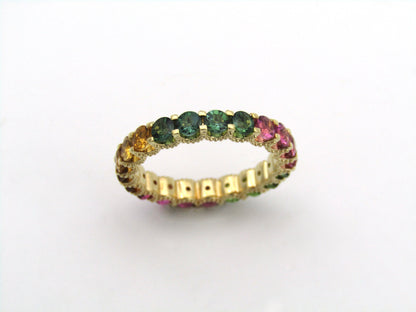 14K gold tourmaline eternity ring.