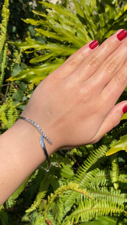 18K gold diamond bangle.