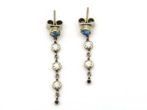 18kt gold diamond and blue topaz earrings by Orpheo.