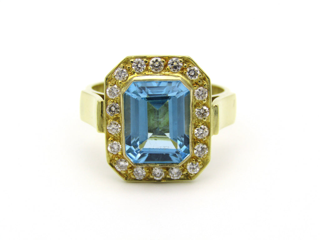 18kt yellow gold blue topaz and diamond ring.