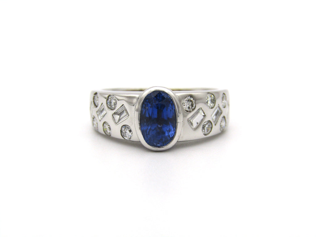 18K gold sapphire and diamond ring.