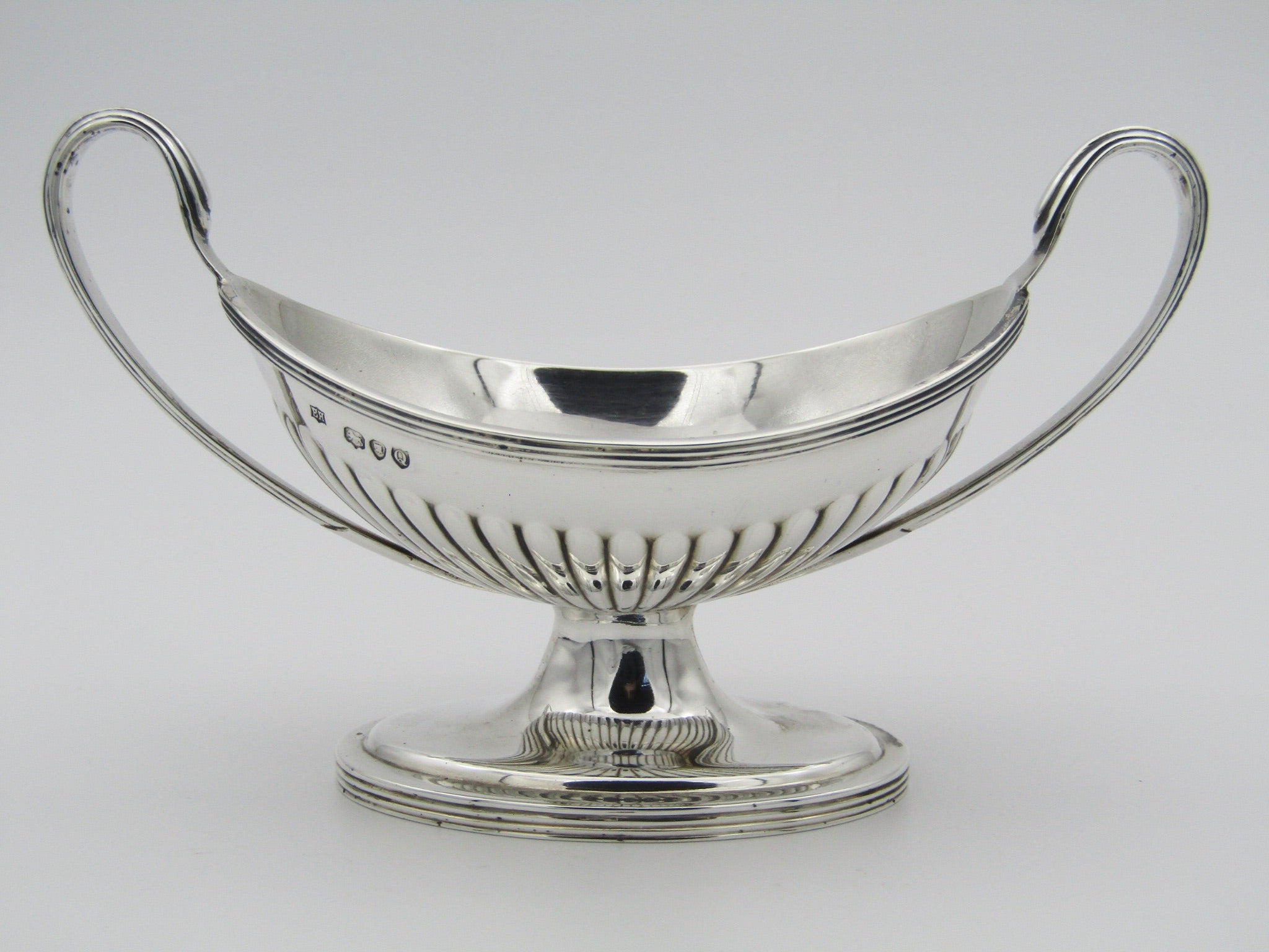 A boxed pair of silver salts by William Hutton & Sons, London, 1891.