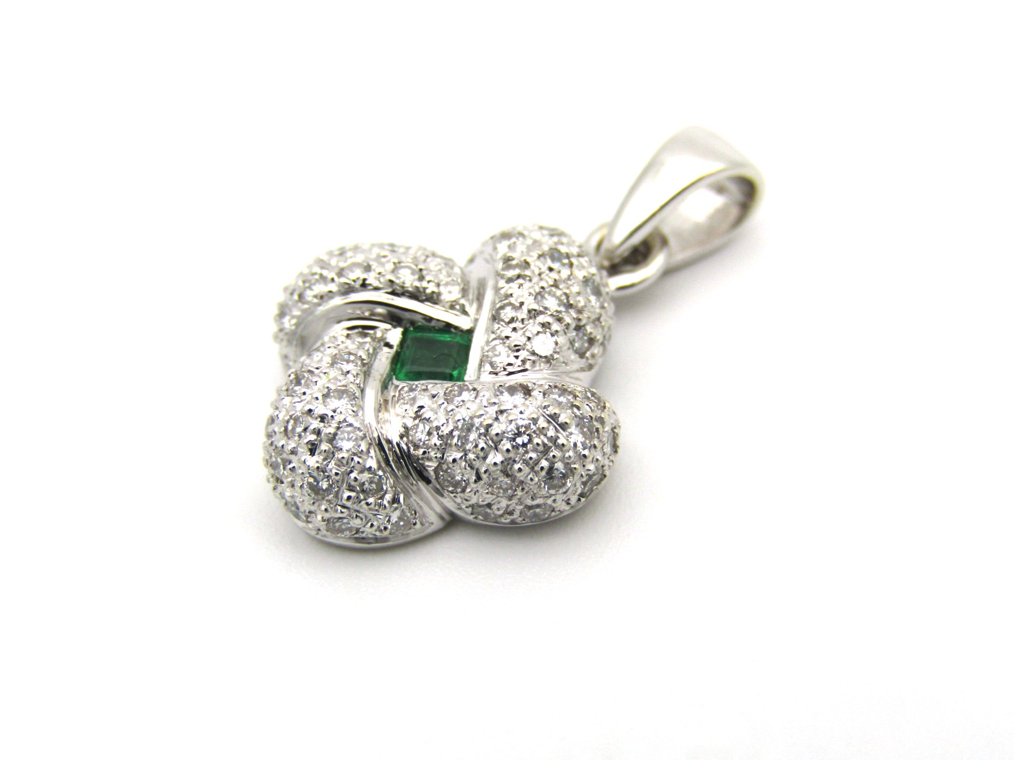 18K gold emerald and diamond pendant.