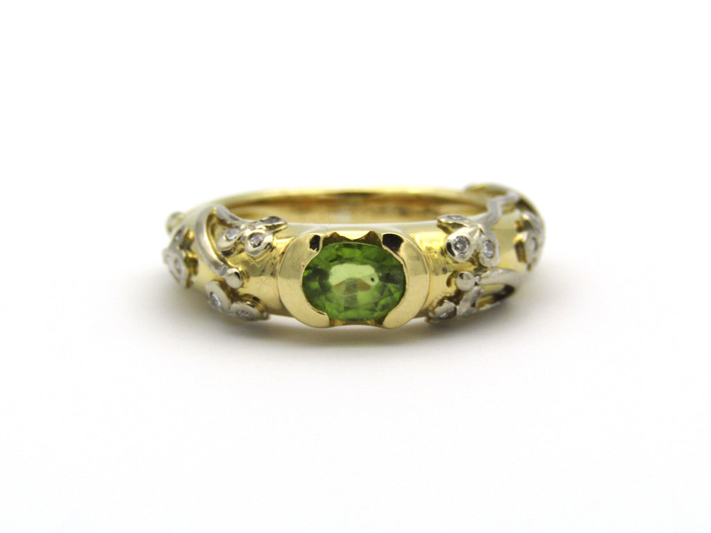 18kt gold peridot and diamond ring.