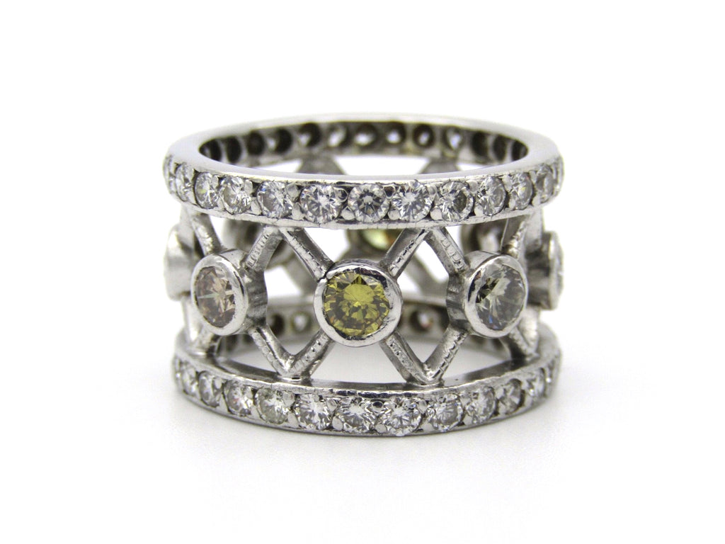 9kt gold fancy and colourless diamond ring.