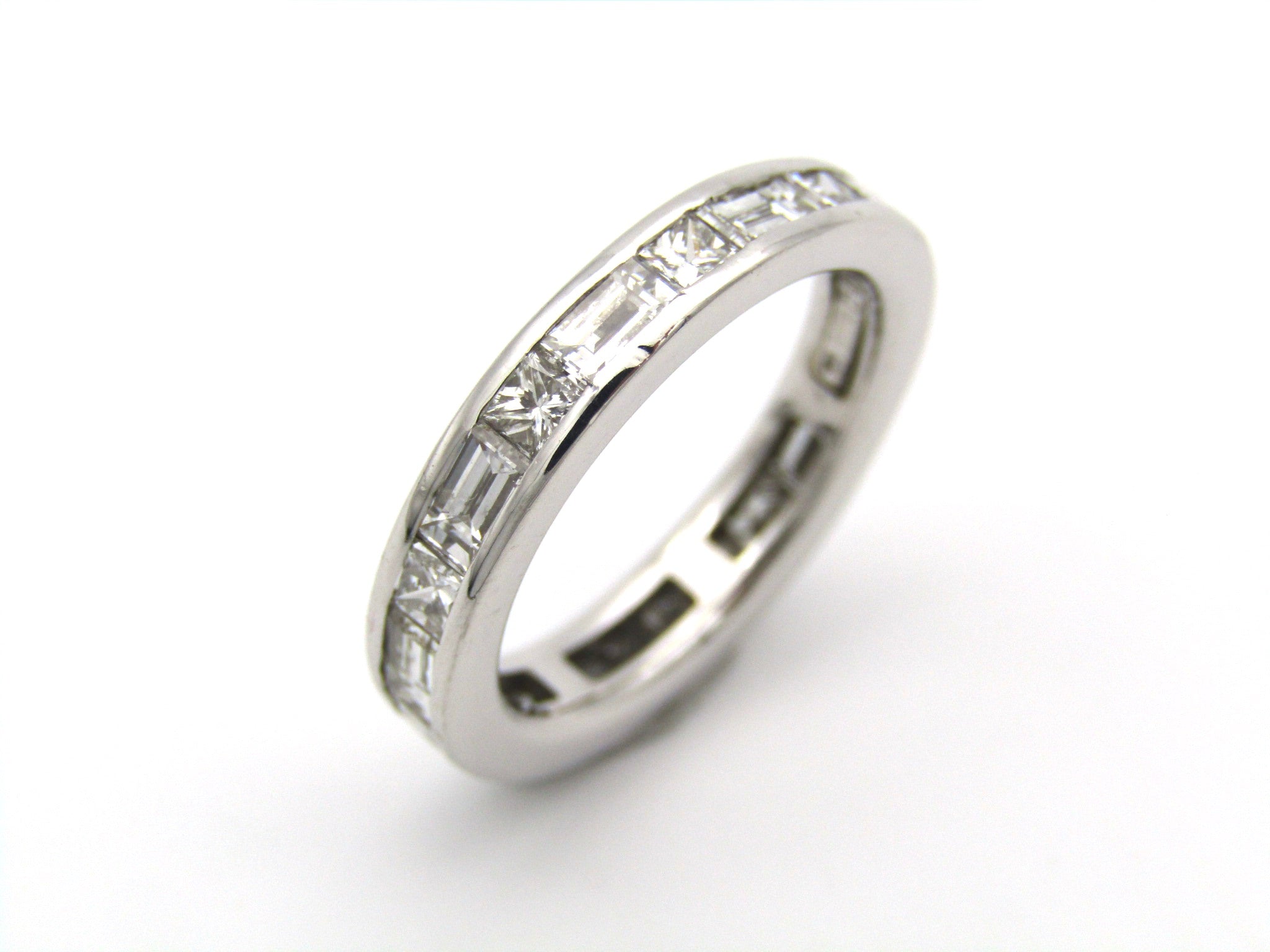 18K gold diamond eternity ring.