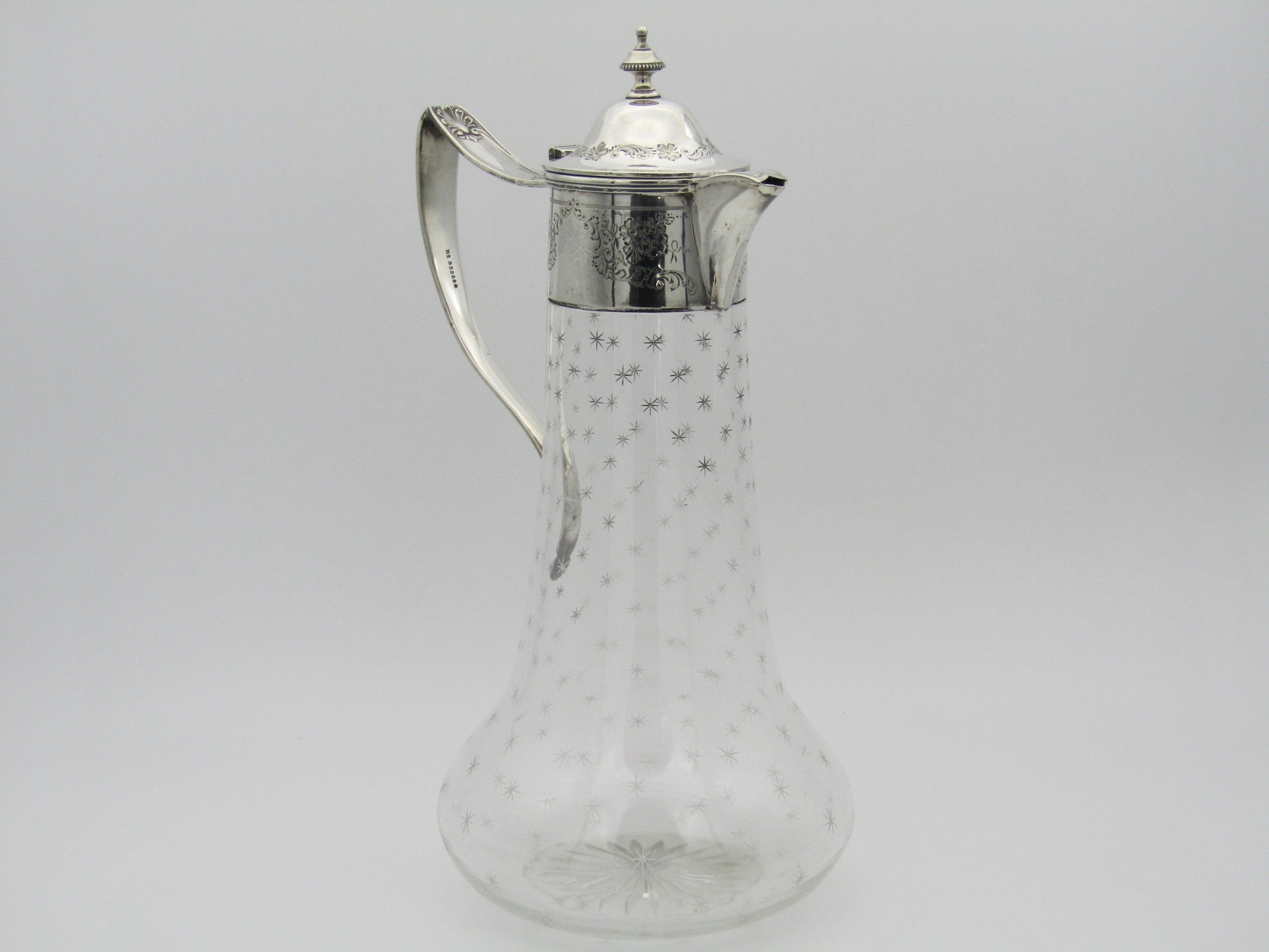 Sterling silver mounted cut glass claret jug by Thomas Henry Blake, Sheffield 1913.