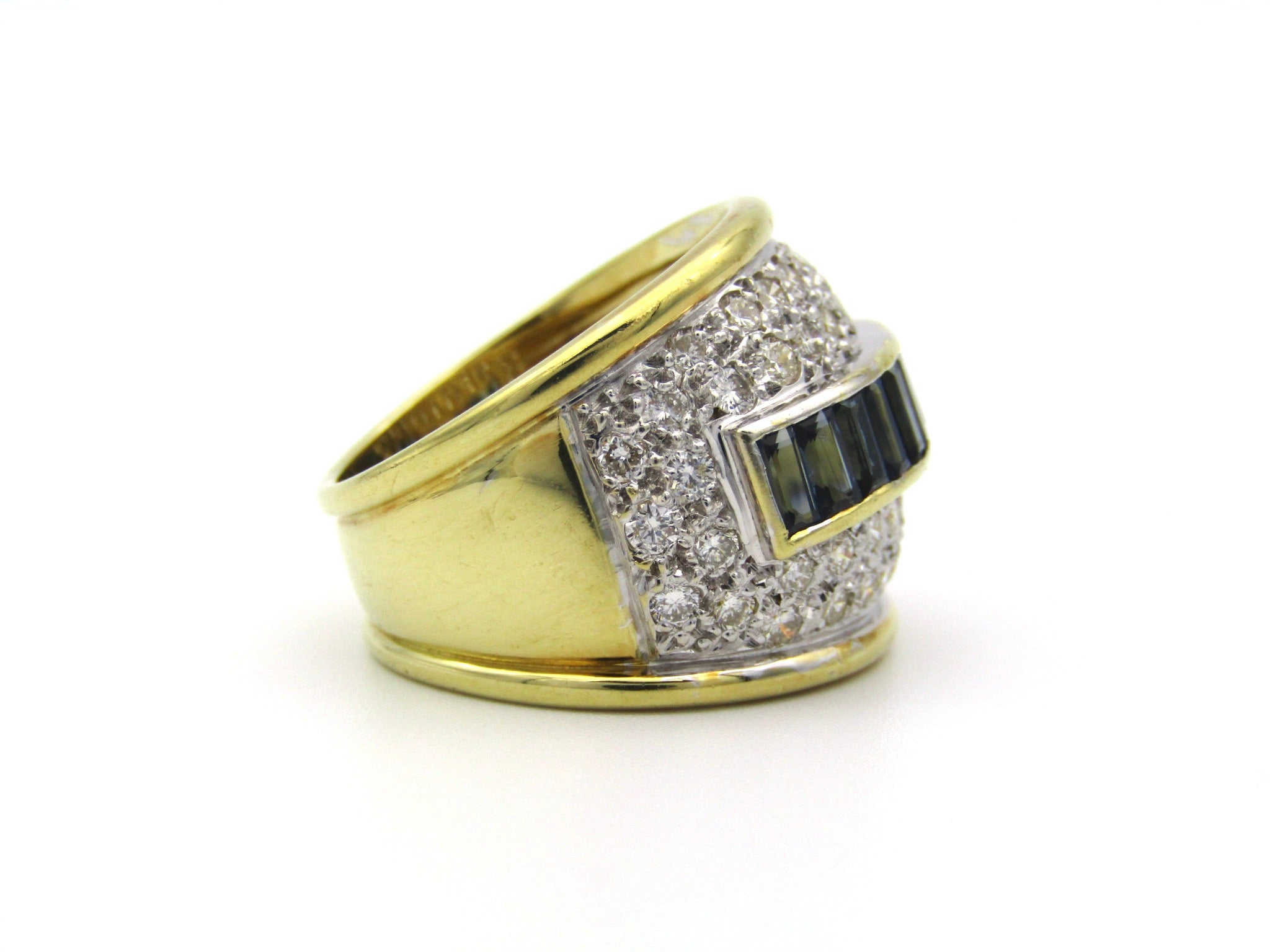 18K gold sapphire and diamond dress ring.